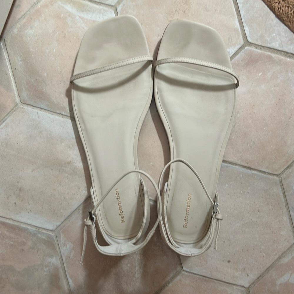 Reformation Mirella Flat Sandal 
Currently $168 on reformation 
Almond Leather